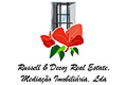 Logo do agente Russell & Decoz - Real Estate Mediação Imobiliaria Lda - AMI 870