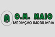 Logo do agente O.M.Maio - Soc. Mediao Imobiliaria e Const.Unip.Lda - AMI 5981